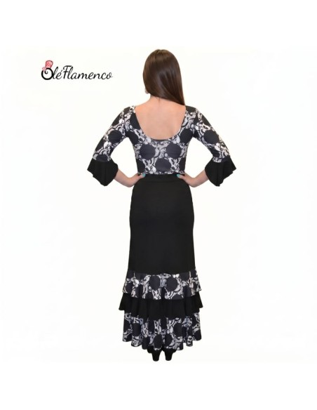 Vista trasera de conjunto de baile flamenco con estampado de lunares XL y falda entallada profesional.