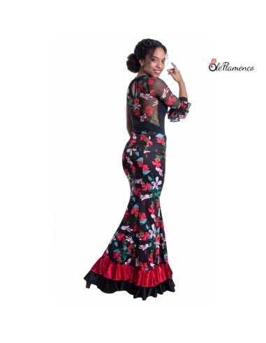 Vista trasera de conjunto de baile flamenco con falda de 4 palas y volantes de terciopelo con caída.